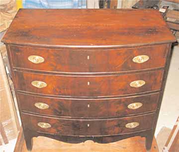 Early 19th century bow front bureau.